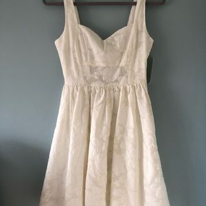 White, floral dress. Tag on. Summer dress.